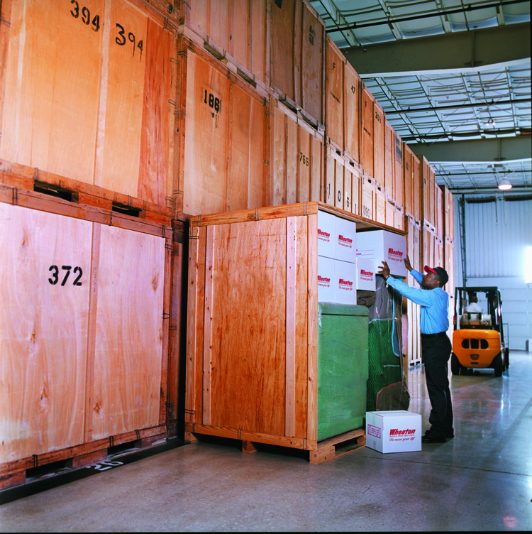 man storing items in a facility